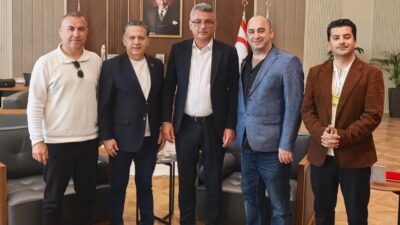 Küresel Gazeteciler Konseyi (KGK) Genel Başkanı Mehmet Ali Dim, KKTC'de